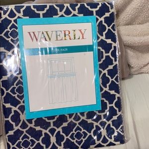New/ never opened Blue pattern curtain!